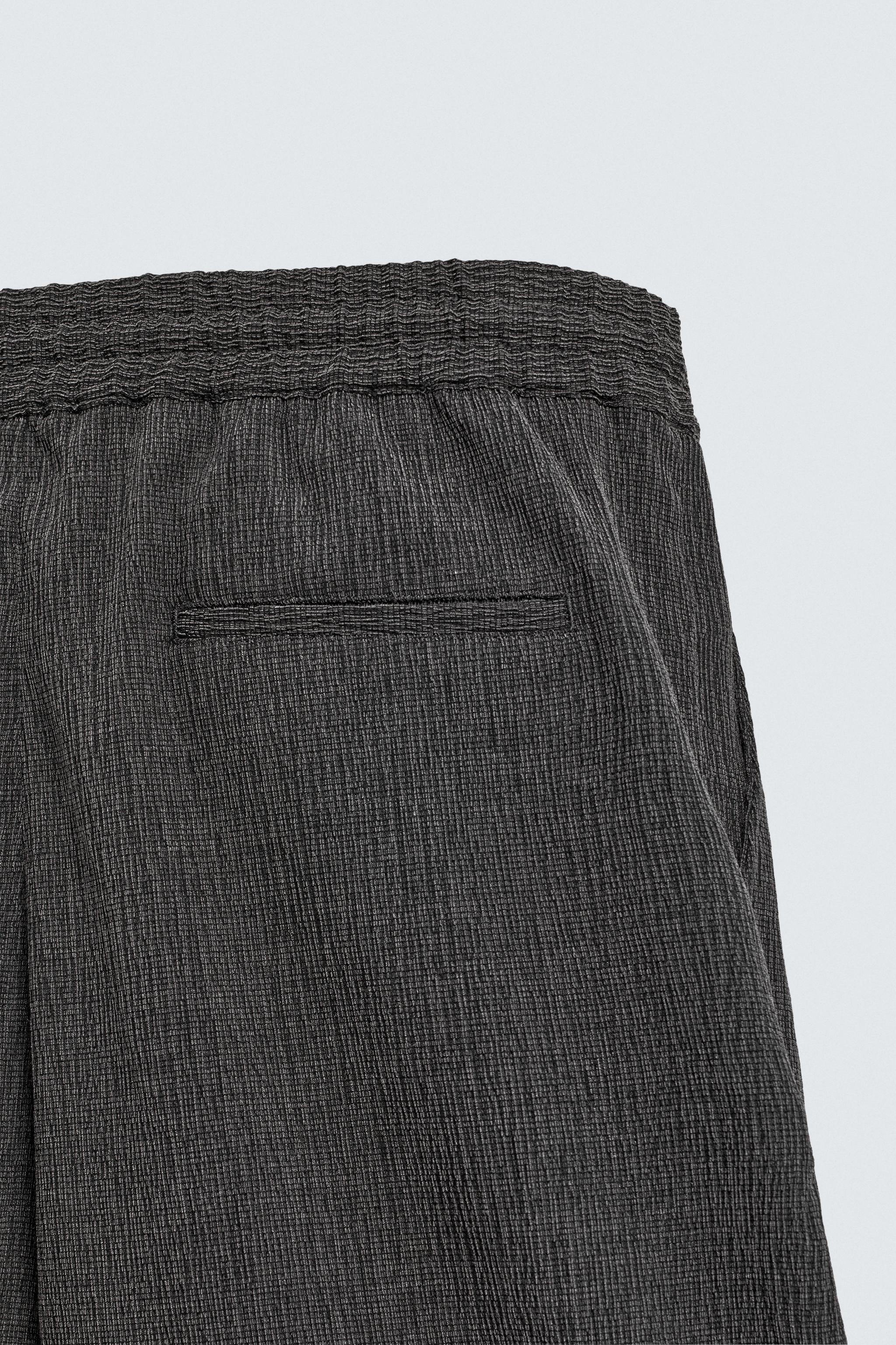 RELAXED FIT EMBOSSED SHORTS